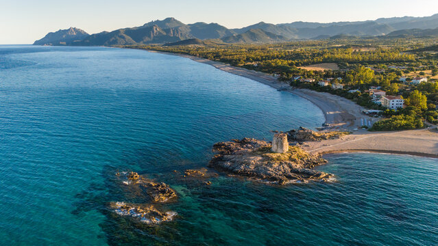 Coastal Sunset Drone View of Torre di Bari in Sardinia