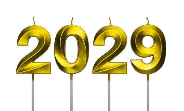 Number two thousand twenty nine shaped golden metallic birthday candles isolated on a white background