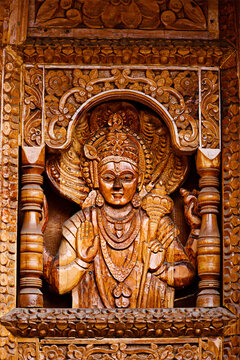 Scene featuring ganesh - wood caring in Hinde temple in Himachal Pradesh, India