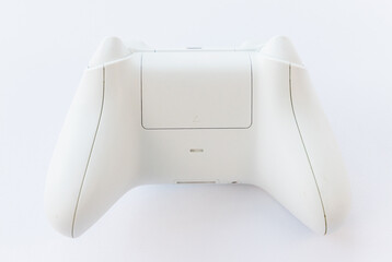 Rear view of a modern white wireless video game controller © YouraPechkin