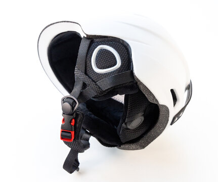 White Ski Snowboard Helmet with Chin Strap Isolated on White Background