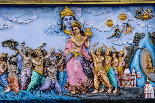 India. Uttarakhand. Haridwar. A bas-relief depicting the mythological episode of the churning of the ocean and the distribution of the elixir of immortality by Mohini, the female avatar of Vishnu