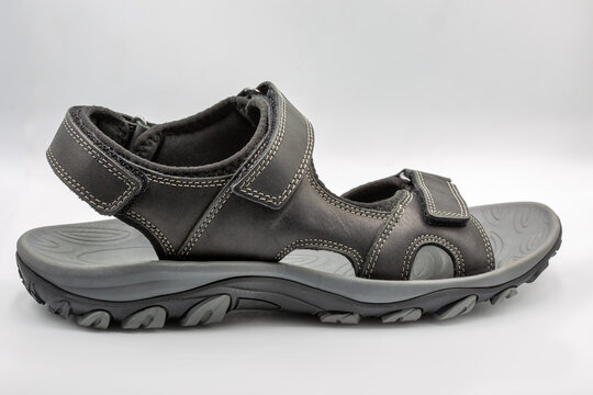 Black Lasocki sport sandals with velcro straps pair closeup.