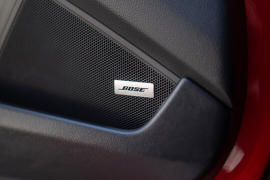 Porsche 911 Carrera door panel bose speaker grille close up, Luxury sports car interior premium audio details