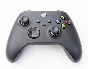 Black Video Game Controller on White Background, Ready for Gaming Sessions © YouraPechkin