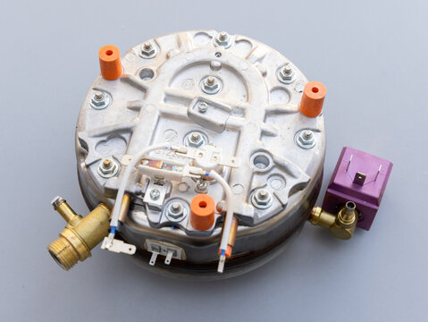Detailed view of an espresso makers internal heating boiler part
