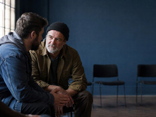 Fototapeta premium Supportive Male Friends Talking Through a Difficult Moment