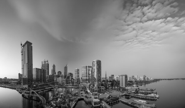 Monochrome drone footage of Perth urban landscape and skyline in springtime