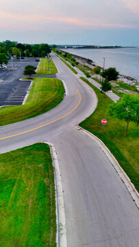 Spectacular sunset aerial panorama of Racine Wisconsin under cloudy skies