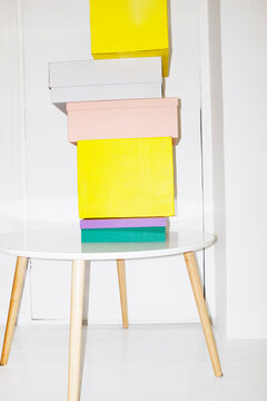 Pile of mockup colourful boxes with empty space for design and text