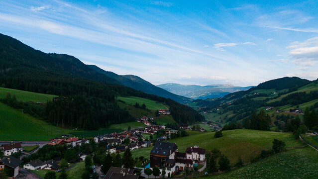 Landscape village Santa Maddalena in mountain valley at sunset in Dolomites, Italy. St. Magdalena and mountains. Val di Funes 