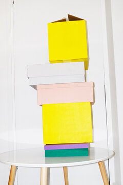 Pile of mockup colourful boxes with empty space for design and text