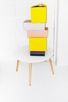 Pile of mockup colourful boxes with empty space for design and text