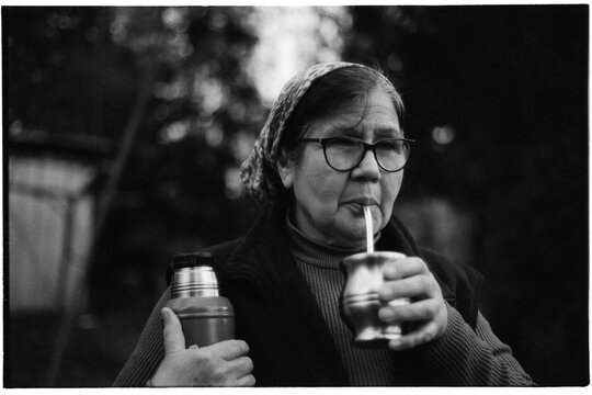 Latina woman drinking mate tea