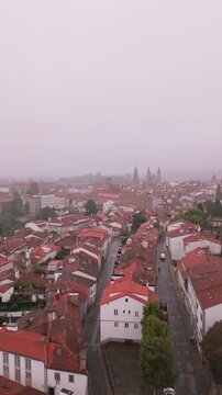 Santiago de compostela cathedral aerial view in the fog