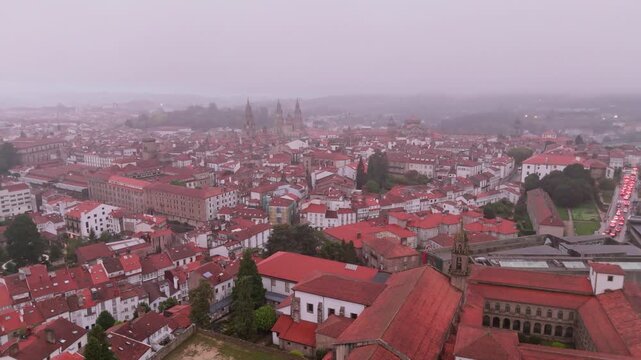 Foggy aerial view of santiago de compostela cityscape