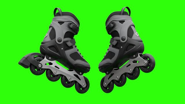 A pair of modern grey and black inline roller skates positioned facing each other on a chroma key green background. Great for easy video keying, sports gear promo clips, and outdoor activity motion gr