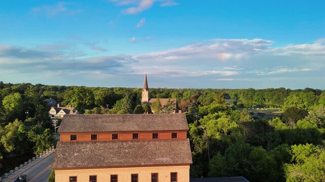 Cinematic aerial view of Cedarburg showing charming town