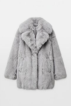 Grey faux fur coat isolated on white background