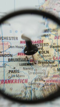 Exploring the map with magnifying glass over Luxemburg