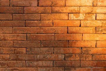 Fototapeta premium Ancient Dry Stacked Red Brick Wall Texture Background for Rustic Architecture