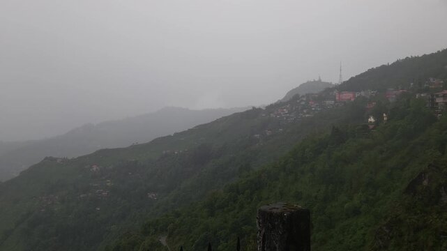 Giddha Pahar View Point in Kurseong, West Bengal, India, Scenic Himalayan Mountain Landscape Covered with Mist and Clouds, Green Hills, Foggy Weather, Mountain Tourism and Travel Background