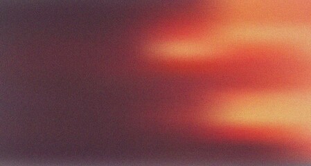 Soft warm orange and red light drifts across a dark textured grain creating a hazy gradient © MdNajmulHaque