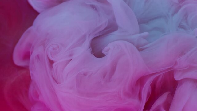 Haze ink. Explosion mist. Defocused pink blue color paint fog splash spill texture cloud spreading on abstract acrylic background.