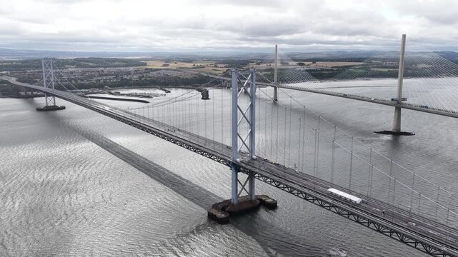Forth road bridge aerial view of traffic and queensferry crossing