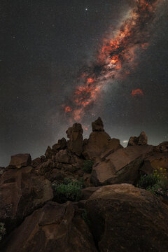 View of the starry night sky over the rocky volcanic landscape of the Mines of San Jose in Santa Cruz de Tenerife, Canary Islands, Spain.