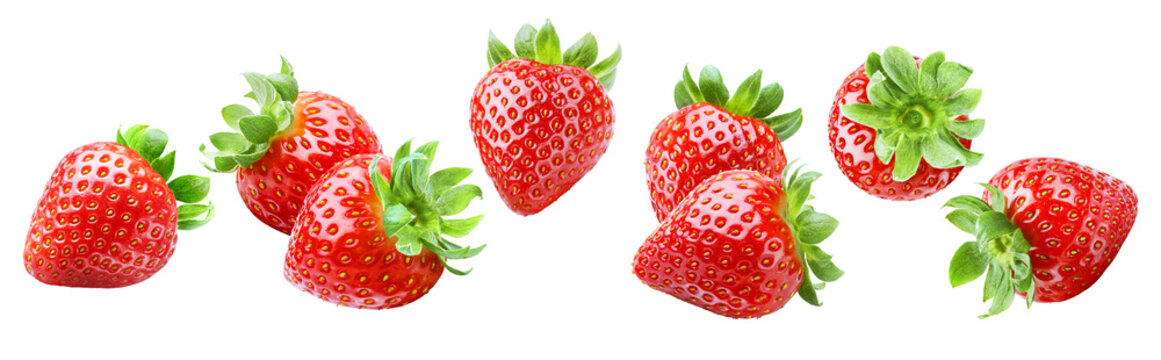 Whole and sliced strawberries floating separately in a horizontal row isolated on transparent background.