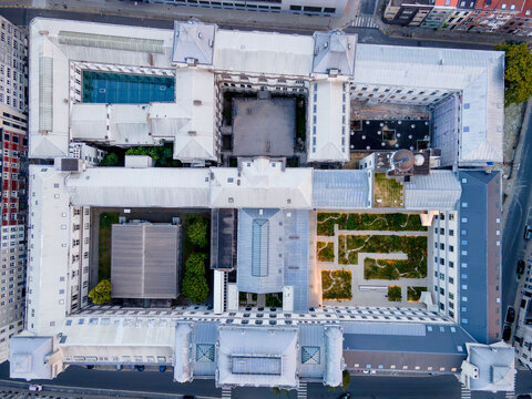 Abstract top down aerial view of the rooftop gardens and geometric courtyards of a Ghent University building in Ghent Belgium a graphic architectural pattern seen directly from above.