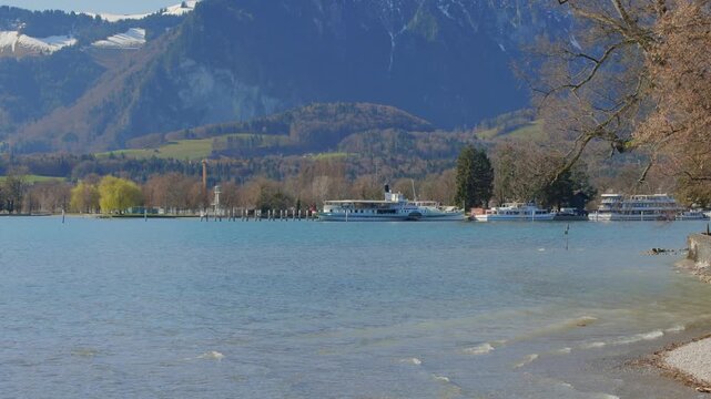 Historic paddle steamer DS Bl&uuml;mlisalp on Lake Thun water