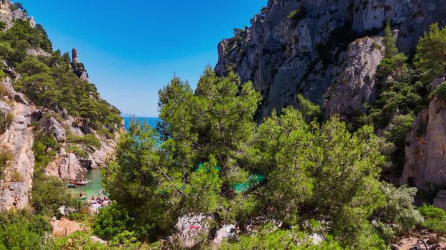 Aerial drone view of the calanques, also known as French fjords, winding bays with turquoise water among high cliffs. Provence, Alps, Cote dAzur, Marseille district, France. High quality 4k footage