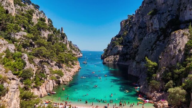Aerial drone view of the calanques, also known as French fjords, winding bays with turquoise water among high cliffs. Provence, Alps, Cote dAzur, Marseille district, France. High quality 4k footage