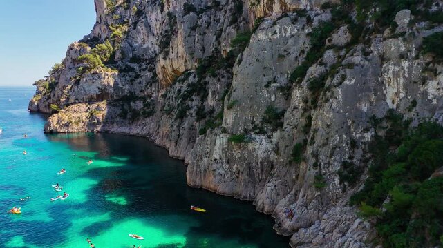 Aerial drone view of the calanques, also known as French fjords, winding bays with turquoise water among high cliffs. Provence, Alps, Cote dAzur, Marseille district, France. High quality 4k footage
