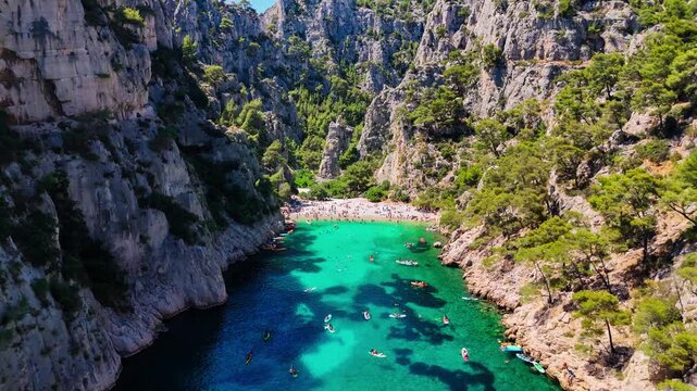 Aerial drone view of the calanques, also known as French fjords, winding bays with turquoise water among high cliffs. Provence, Alps, Cote dAzur, Marseille district, France. High quality 4k footage