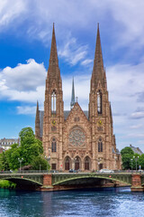 St. Paul's Church, a striking Neo-Gothic landmark with twin spires, stands beside the Ill River in...