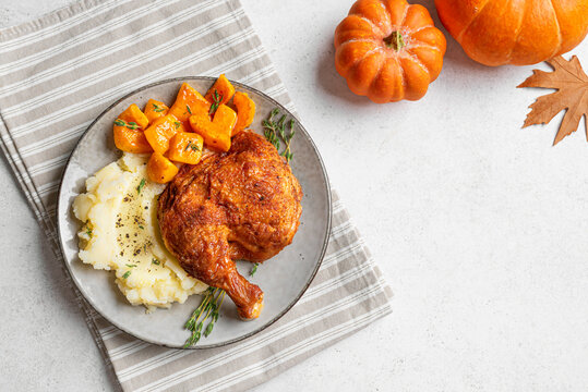 Autumn meal: roasted chicken with pumpkin and mashed potato
