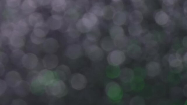 Shiny particles glare. Defocused sparkle reflection. Gray flicker luminosity color rotation. Abstract ray circles spot transition background.