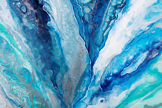 Blue and turquoise fluid acrylic pour painting abstract texture