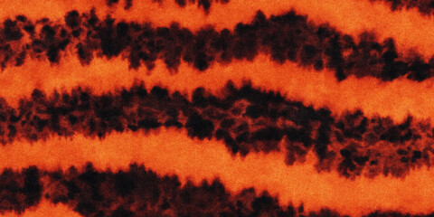 Tiger fur pattern texture, close up of orange and black animal stripes background. © Nasrin