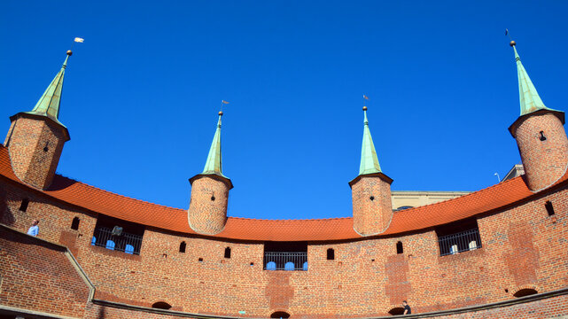 KRACOW POLAND: The Krakow Barbican a fortified outpost once connected to the city walls. It is a historic gateway leading into the Old Town of Krakow, Poland. 