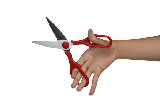 hand holding scissors. isolated image of hand holding a scissor.
