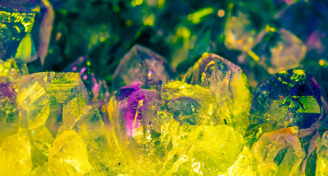 Multi-colored crystal mineral stone. Gems. Mineral crystals in the natural environment. Texture of precious and semiprecious stones. shiny surface of precious stone