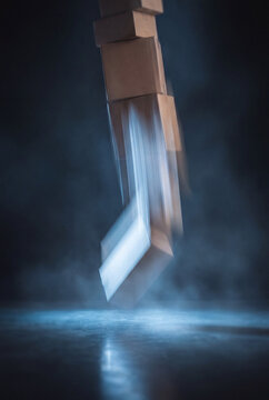 Cardboard Parcel Entering a Vertical Digital Transport Portal
