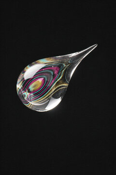 Toughened Glass Teardrop With Rainbow Stress Fringes on Black
