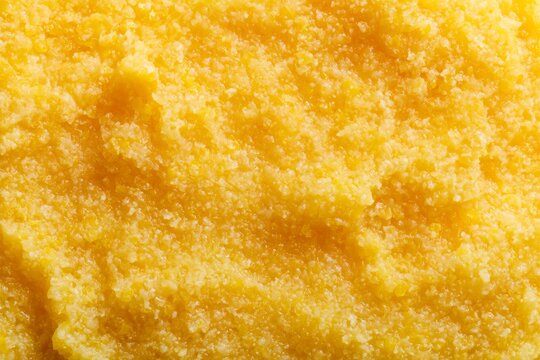 Fine ground cornmeal is prepared for cooking in a kitchen setting during a daytime activity