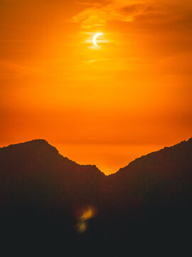 Sant Elm, Balearic Islands, Spain - 12 August 2026: Aerial view of the solar eclipse over the silhouette of Sa Dragonera island during the 2026 total solar eclipse.