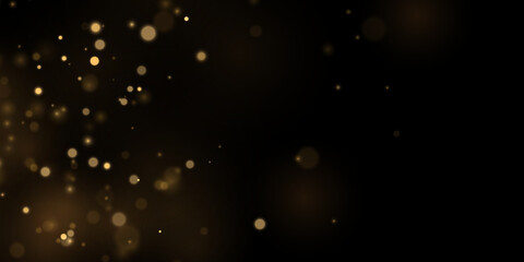 Glowing golden dust swirls through black space. Bright sparks create a festive feeling. Abstract vector holiday design. © Extrastock